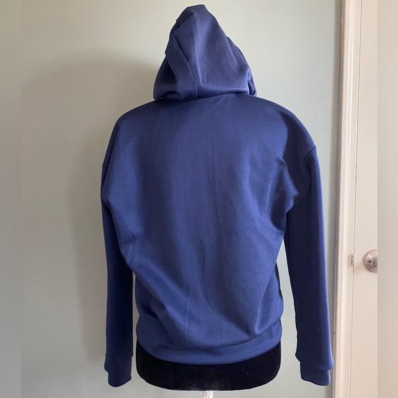 New Balance Women's Determination Reversible Jacket - Picture 10 of 16